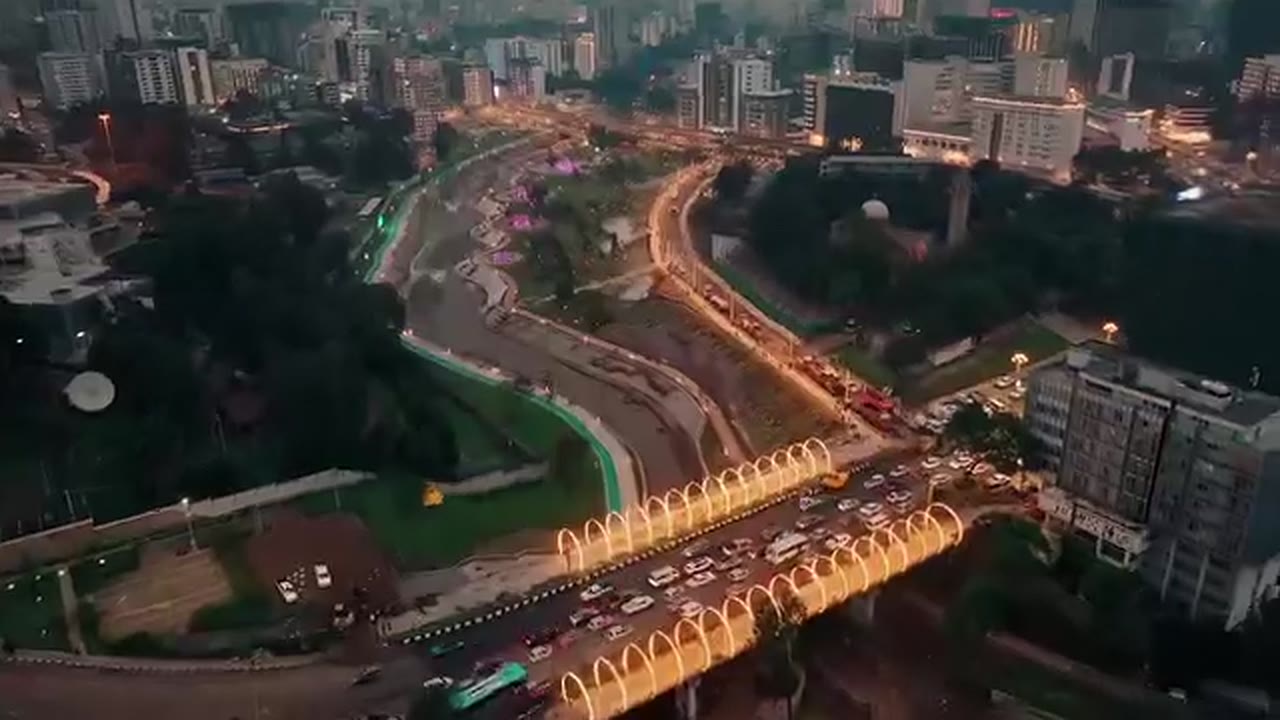 Aerial view of Addis Ababa’s lit-up roads and green spaces at dusk